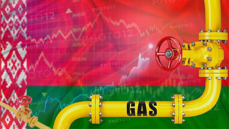 Gas pipeline with the Belarusian flag in the background. Gas production with the Belarusian flag on a market chart