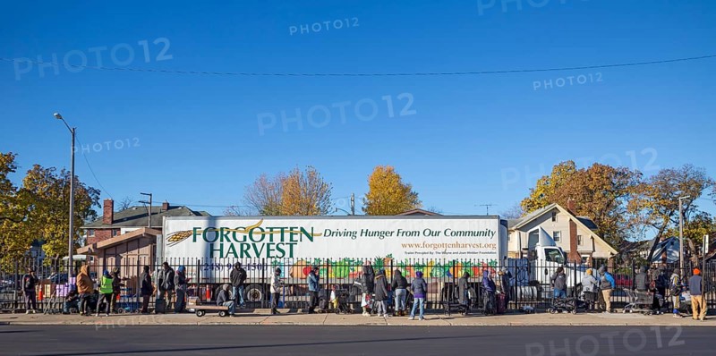 Detroit, Michigan USA - 4 November 2025 - People wait in line to pick up groceries from the anti-hunger nonprofit, Forgotten Harvest. Demand at food pantries and soup kitchens has risen dramatically since the federal government shutdown cut SNAP benefits