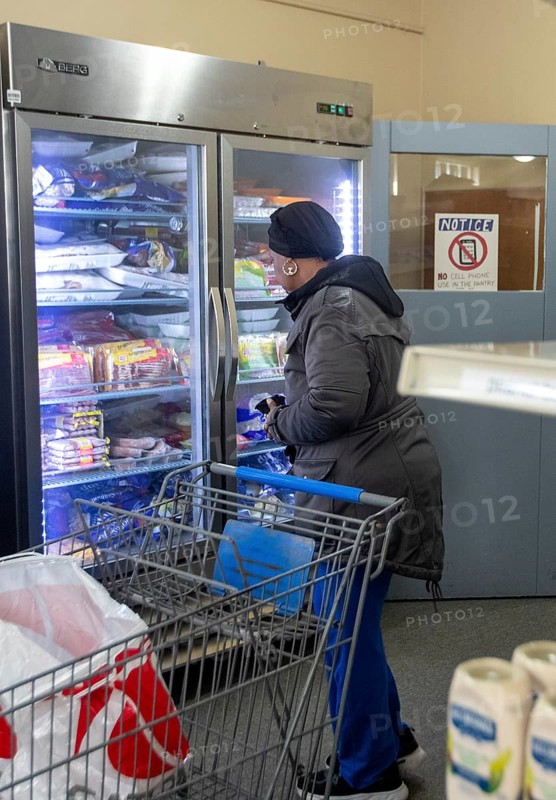 Detroit, Michigan USA - 4 November 2025 - People pick up groceries at the nonprofit Deo Gratias Food Pantry, operated by theFelician Sisters. Demand for emergency food at food pantries and soup kitchens has risen dramatically since the federal government shutdown cut SNAP benefits