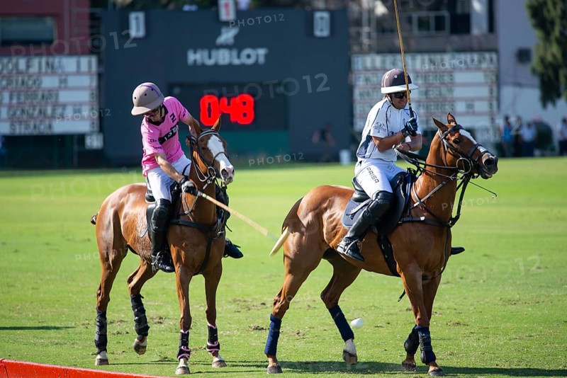 Scene at the 132nd Argentine Open Polo Championship (Spanish Campeonato Argentino Abierto de Polo), Antonio Heguy from the Ellerstina Indios Chapaleufú Vista team hits the ball against Mariano Gonzalez from the team La Dolfina II, Buenos Aires, Argentina