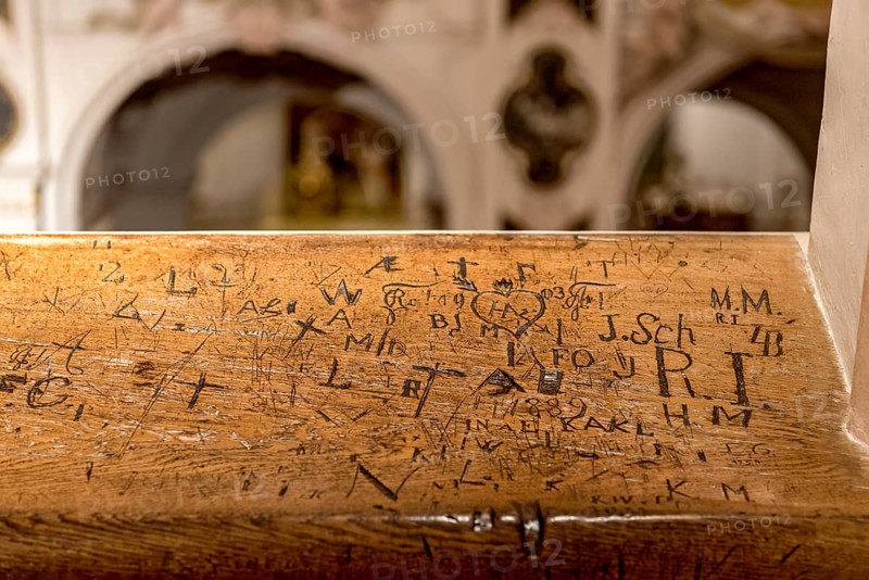 Initials, inscriptions, signs, doodles, graffiti, carved by bored churchgoers in church stalls, gallery on the central aisle of the Freising Cathedral of St. Maria and St. Korbinian, Freising, Upper Bavaria, Bavaria, Germany