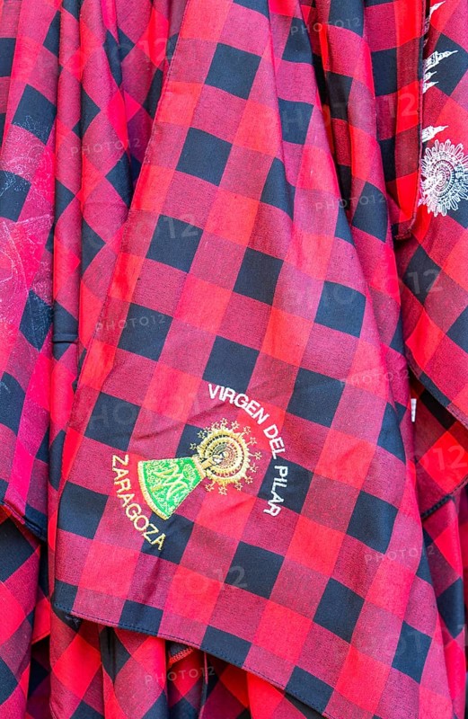 Traditional red chequered scarf worn during fiesta Virgen del Pilar Zaragoza, Aragon, Spain