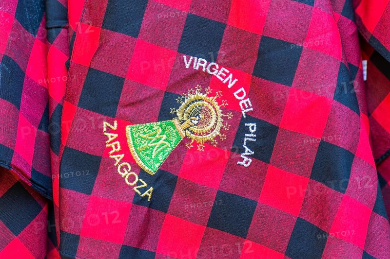 Traditional red chequered scarf worn during fiesta Virgen del Pilar Zaragoza, Aragon, Spain