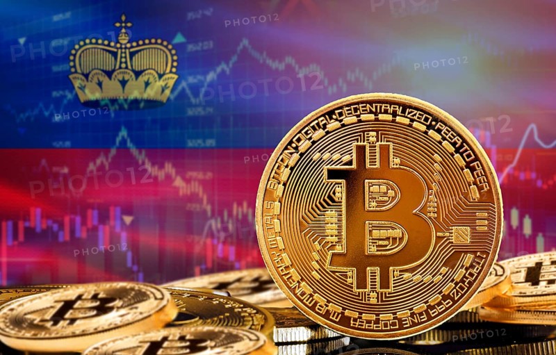 Investors in cryptocurrency and Blockchain Technology in Liechtenstein, Concept. Bitcoin with Liechtenstein flag in the background