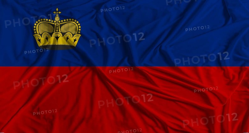 Liechtensteiner flag with fabric texture background. National flag of Liechtenstein with cloth texture