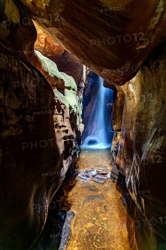 Waterfall inside a cave in Ouro Preto, Minas Gerais state, Ouro Preto, Minas Gerais, Brazil