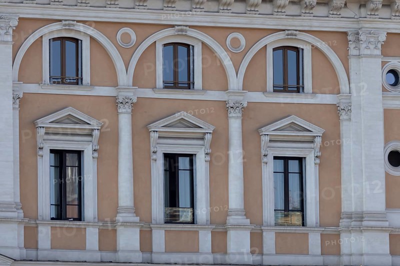 Windows of a building in the city of Rome, Italy