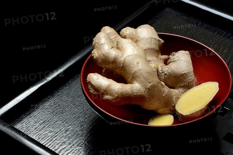 Ginger, ginger root in tea bowl, Zingiber officinale, tea preparation