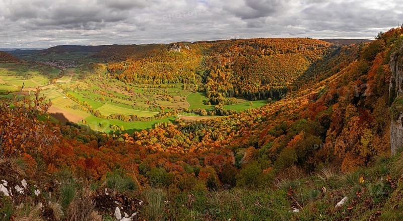 Panoramic picture of Indian Summer on the Swabian Jura in the Nenninger Valley with Reussenstein Castle Ruins