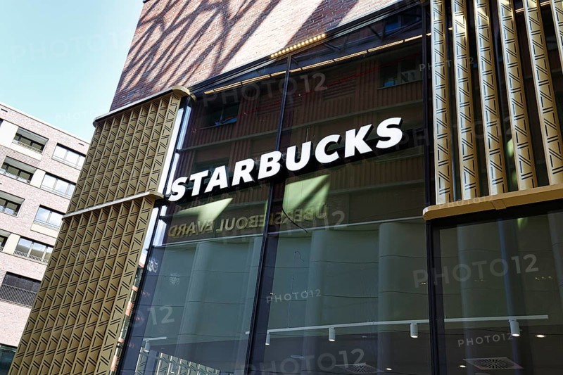 Glass façade with Starbucks lettering, Westfield Überseequartier, modern shopping center, HafenCity, Hamburg, Germany