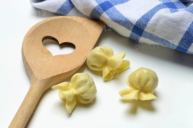 Saccottini, type of Italian pasta and cooking spoon with heart, pasta from Italy