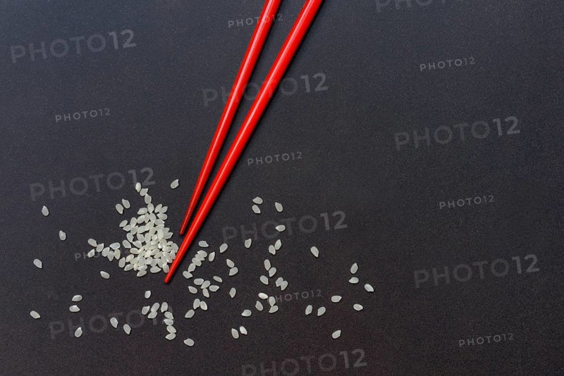 Rice and chopsticks. Oryza