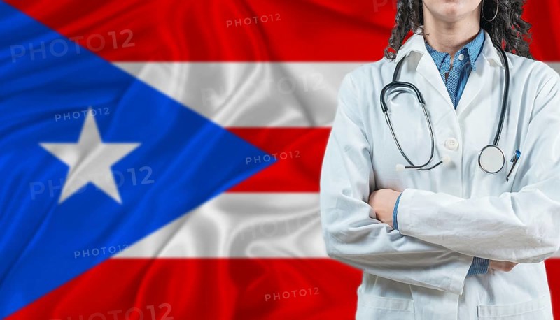 Medical professional on Puerto Rico flag. Healthcare and wellness in Puerto Rico, Concept