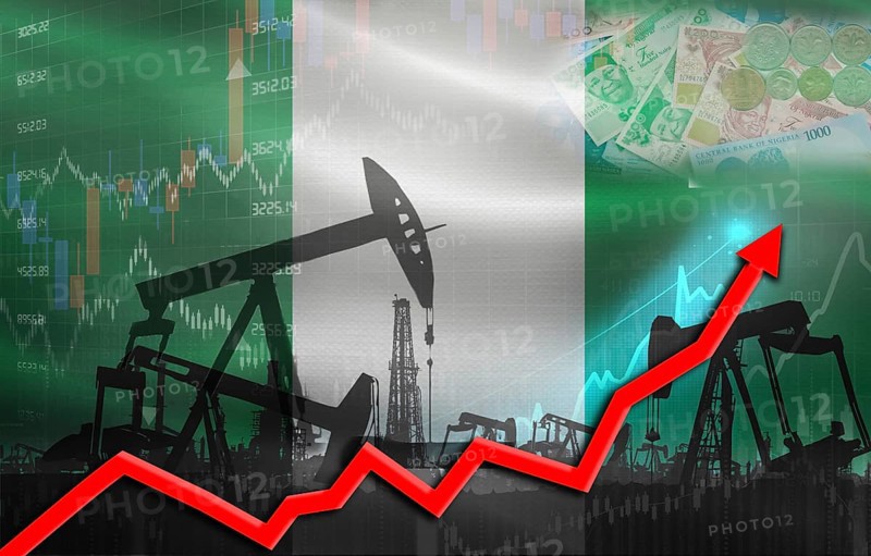 Oil production with Nigeria flag, petrol industry. Oil pumps with Nigerian flag