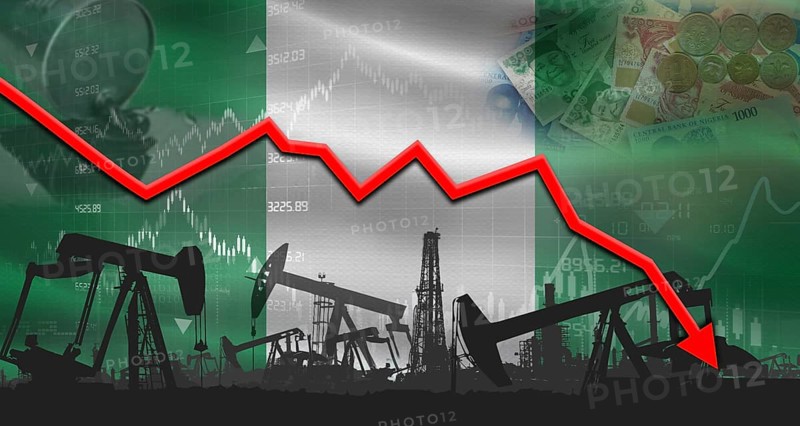 Fall oil price with Nigerianflag on economic chart, Petrol crisis with Nigerian flag on financial graph