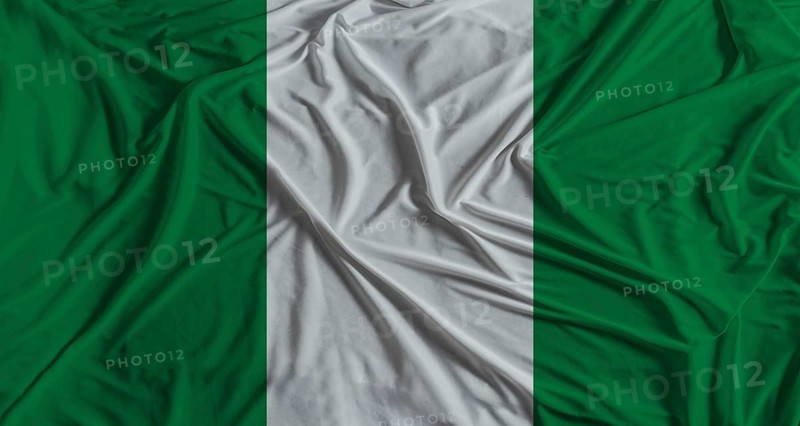 Nigerian flag with fabric texture background National flag of Nigeria with cloth texture