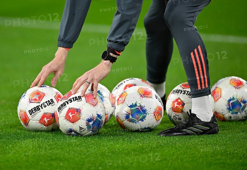 Detailed view, goalkeeper coach Michael Rechner FC Bayern Munich FCB sets Adidas Derbystar match balls Allianz Arena, Munich, Bayern, Germany