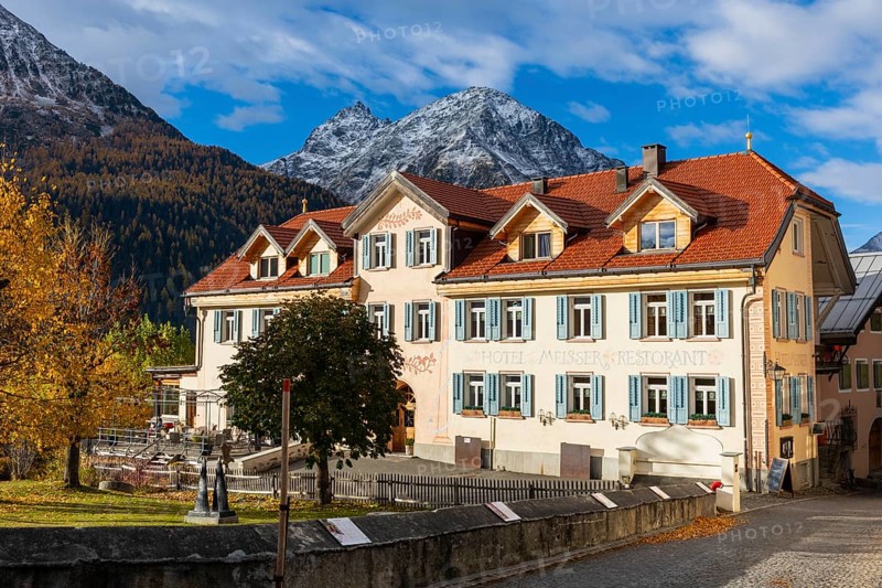 Hotel Meisner, historic houses, Piz Mezdi, Piz d'arpiglias, autumn, Guarda, Engadin, Graubünden, Switzerland