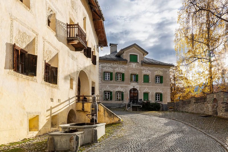 Engadin houses, historic houses, Dorstrasse with houses, birch, autumn, Guarda, Engadin, Grisons, Switzerland