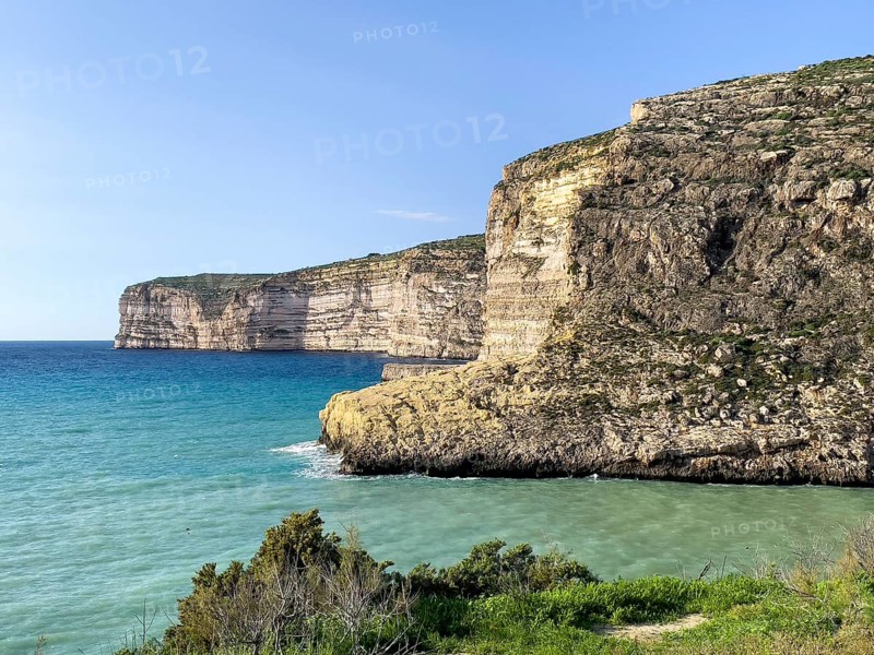 Rugged high cliffs on the Mediterranean Sea of Gozo Island, Gozo, Malta