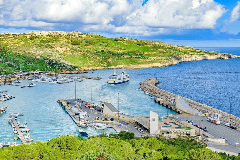 View from elevated position of ferry car ferry leaving Mgarr port of Gozo island, Gozo, Malta