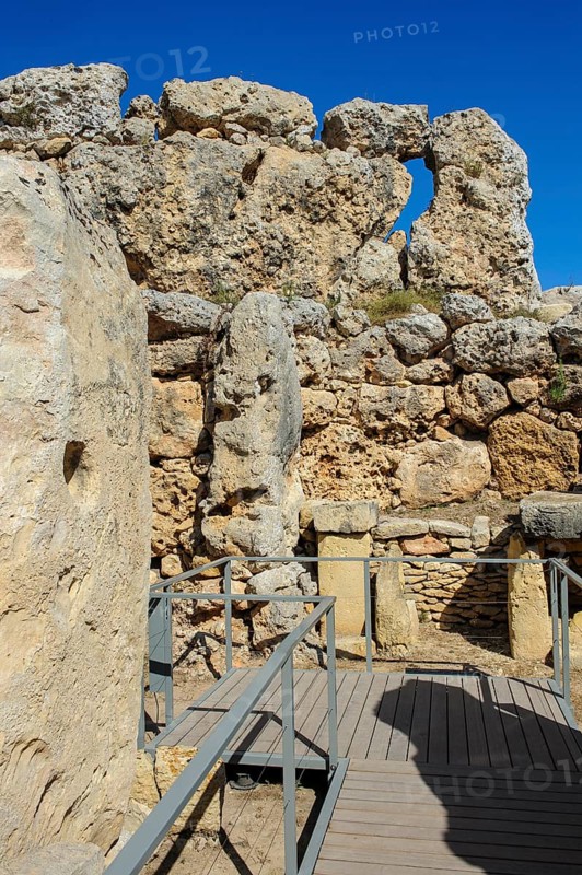 View from secured walkway with railing through ruins remains of Ggantija temple, UNESCO World Heritage Site, Gozo, MaltagGantija temple, UNESCO World Heritage Site, Gozo, Malta