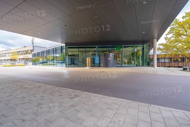 Modern building with covered entrance and large glass front, Calw District Office, Calw, Germany