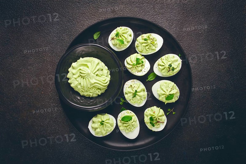 Snack, stuffed eggs with avocado, homemade, no people