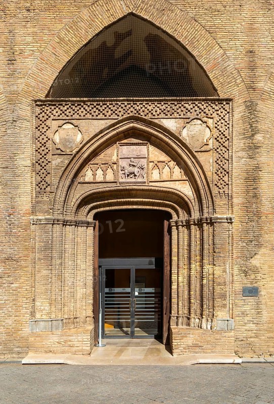 Stonework design historic arched door, Aljafería Palace, Zaragoza, Aragon, Spain, Europe - doorway entrance Chapel of San Martín