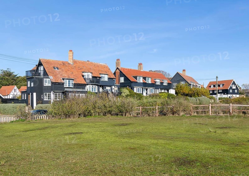Wooden houses of The Dunes in planned seaside holiday village of Thorpeness, Suffolk, England, UK c 1920s 1930s