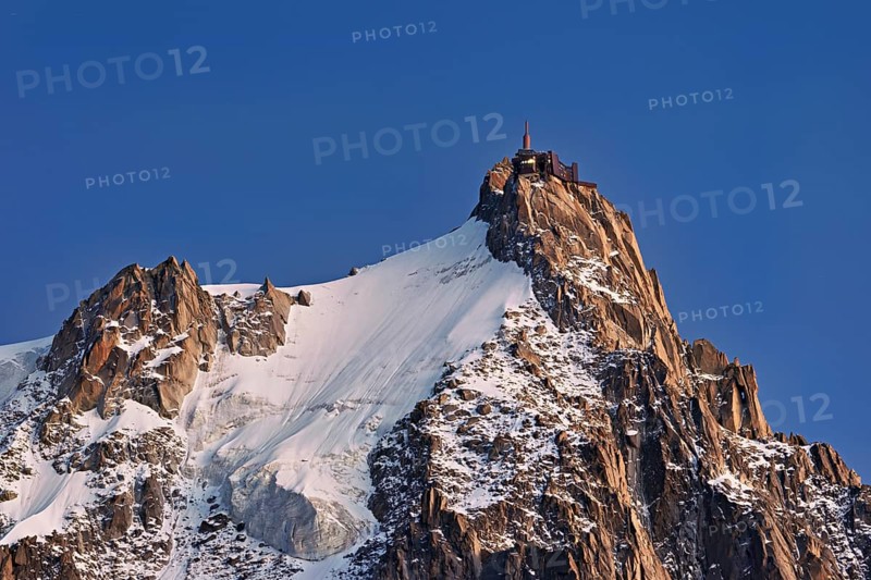 Snowy Aiguille du Midi in the evening light, Mont-Blanc, Chamonix-Mont-Blanc, Haute-Savoie, France