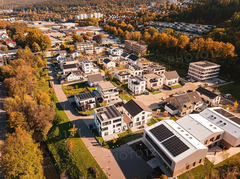 Modern residential buildings with solar panels in autumn surroundings, Nagold, Black Forest, Germany