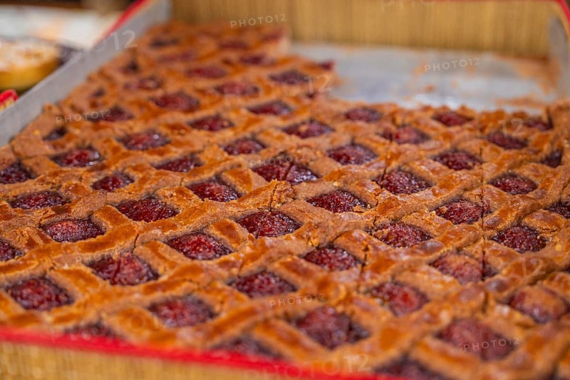 Large raspberry cake with grid pattern presented on a tray, Streuobstmarkt, Sindelfingen, Böblingen district, Germany