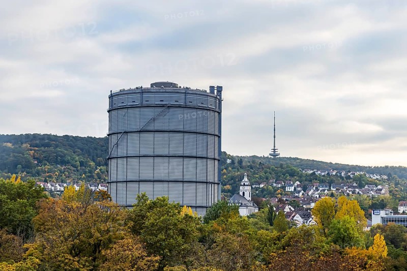 Stuttgart East with the 100-meter high gas boiler. The landmark of the complex is the 100-meter high gasometer. For a long time, it was Europe's largest disk gas container still in operation. It is a listed building. Stuttgart, Baden-Württemberg, Germany