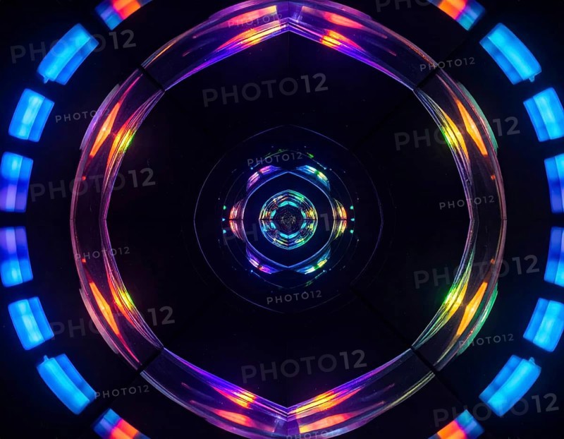 Abstract background of slightly unfocused multicolored glass lenses spinning and rotating, wallpaper illustration in vibrant neon colors, mandala background for business, textures and pattern, AI generated