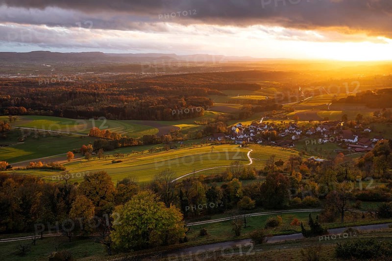 Sunset — dramatic autumn atmosphere at Hohenstaufen, Spielburg Nature Reserve, Göppingen, Baden-Württemberg, Germany