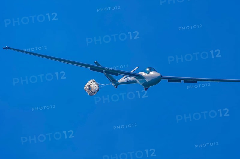 A Hänle H-101 somersault glider, registration D-3033, during a demonstration as part of an air show at the Fliegerbergfest of the Rossfeld Luftsportverein in Metzingen-Glems, Baden-Württemberg, Germany, for editorial use only