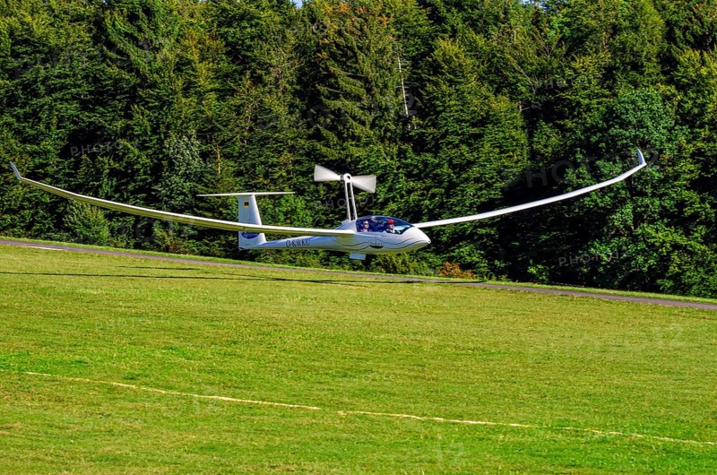 A Schempp-Hirth Arcus E motor glider, registration D-KWKU, during a screening as part of an air show at the Fliegerbergfest of the Rossfeld Luftsportverein in Metzingen-Glems, Baden-Württemberg, Germany, for editorial use only