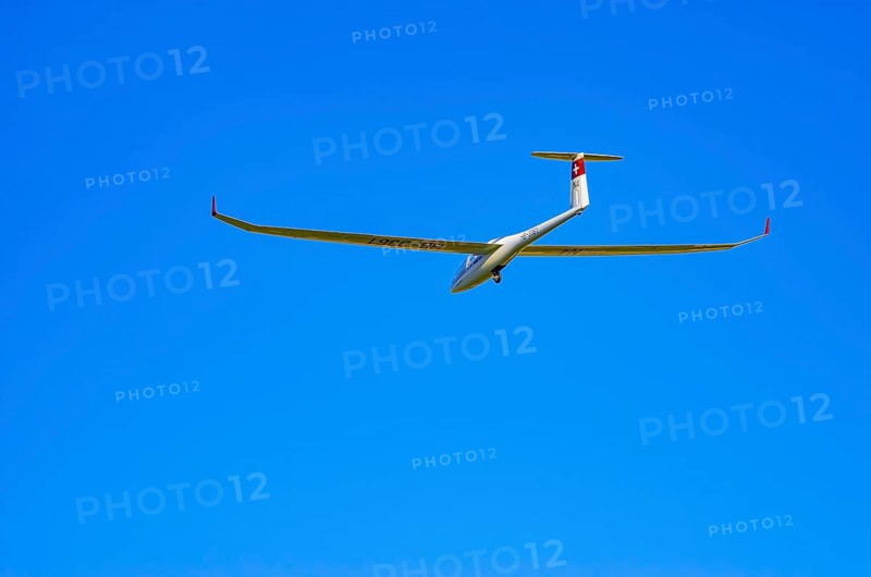 A DG Flugzeugbau glider DG-1000, registration HB-3361, during a demonstration as part of an air show at the Fliegerbergfest of the Rossfeld Luftsportverein in Metzingen-Glems, Baden-Württemberg, Germany, for editorial use only