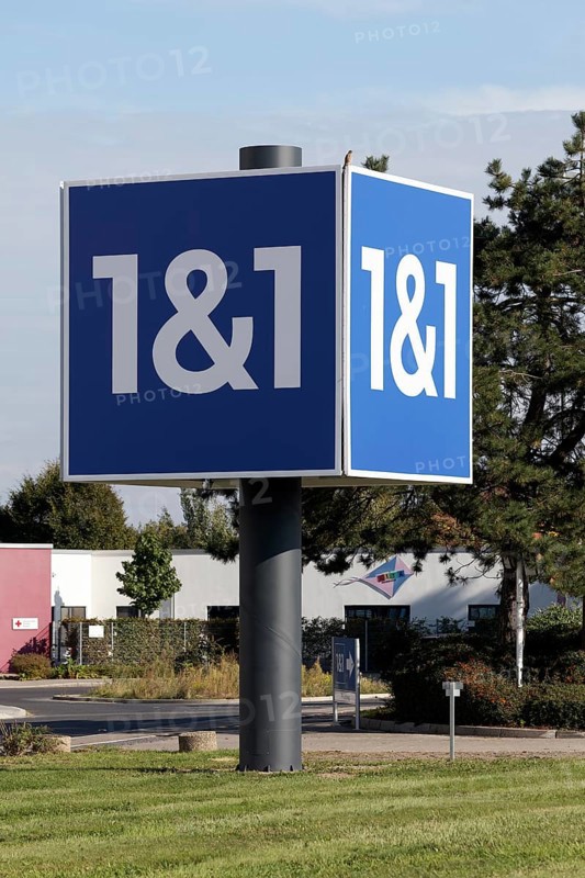 Telecommunications company 1&1, advertising column at the company headquarters 1&1 Versatel, United Internet AG, Düsseldorf, North Rhine-Westphalia, Germany