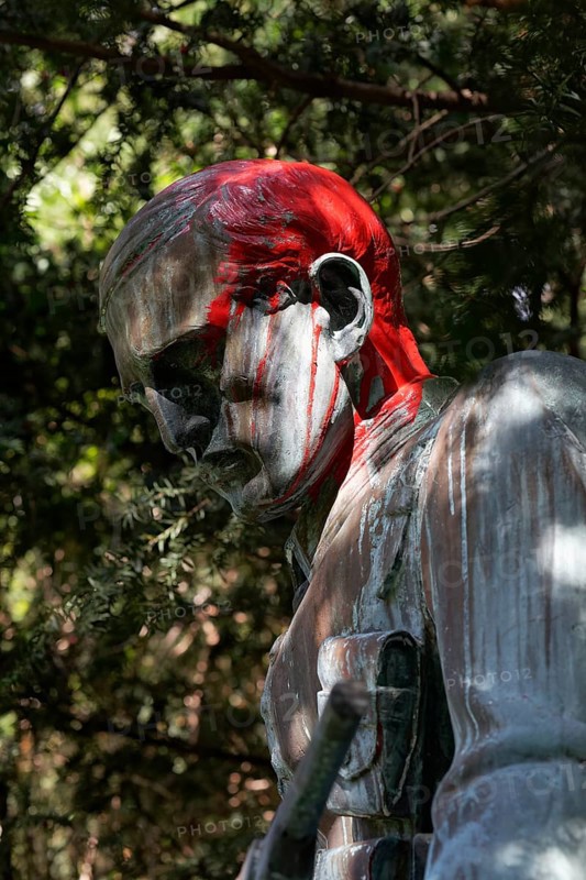 Colonial War Memorial, head sprayed with red paint, in commemoration of the Herero and Nama genocide in German Southwest Africa, Düsseldorf, North Rhine-Westphalia, Germany