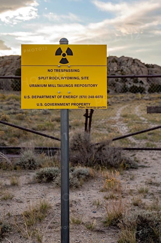 Jeffrey City, Wyoming - 'No Trespassing' signs adorn the perimeter of a former uranium mine and mill which operated from 1957 until 1981. Uranium tailings and other radioactive debris have been buried and the site is now under the care of the Department of Energy