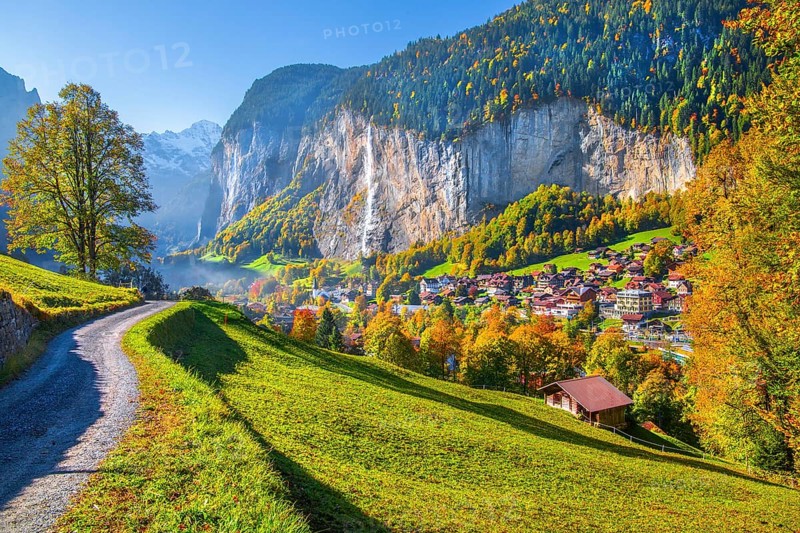 View of town and valley with Staubbach waterfall in autumn, Lauterbrunnen, Bernese Oberland, Canton of Bern, Switzerland