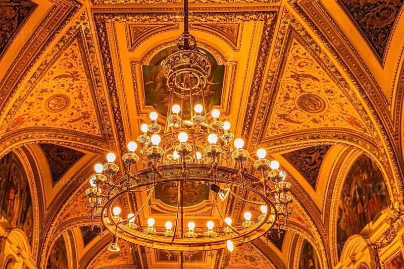Sumptuous room and chandelier in the Vienna State Opera, Vienna, Austria