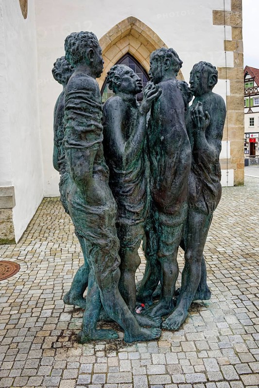 Bronze sculpture Disput, created by Munich artist Hubertus von Pilgrim, Marktplatz, Pfullingen, Baden-Württemberg, Germany