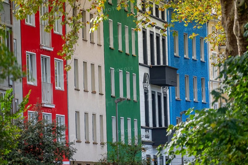 Residential buildings in Düsseldorf-Bilk, facades with different colors, rental apartments, past, North Rhine-Westphalia