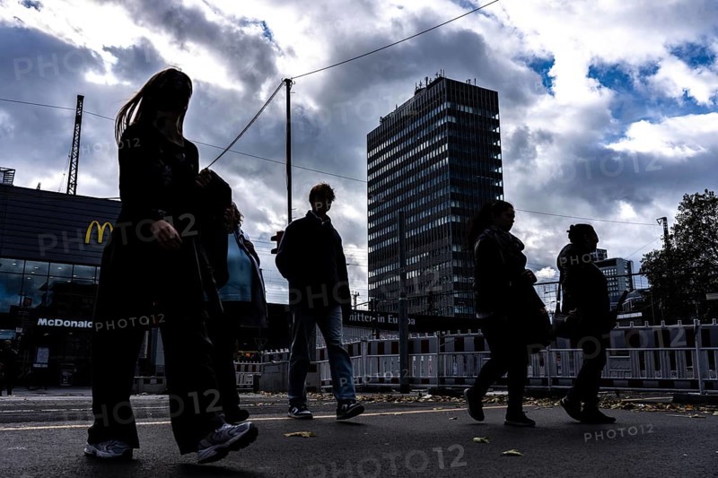 Passers-by in downtown Essen at the main train station, North Rhine-Westphalia, Germany