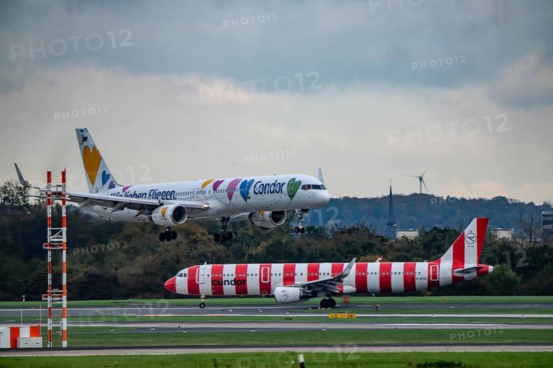Condor aircraft landing and waiting for takeoff at Düsseldorf Airport, North Rhine-Westphalia, Germany