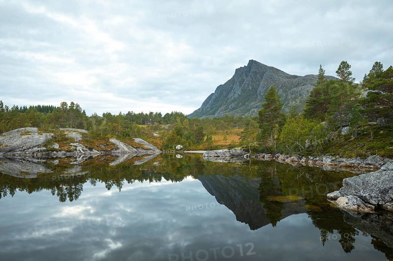 Magical morning on Steigtindvatnet in front of the majestic Litltind in Norway near Bodø