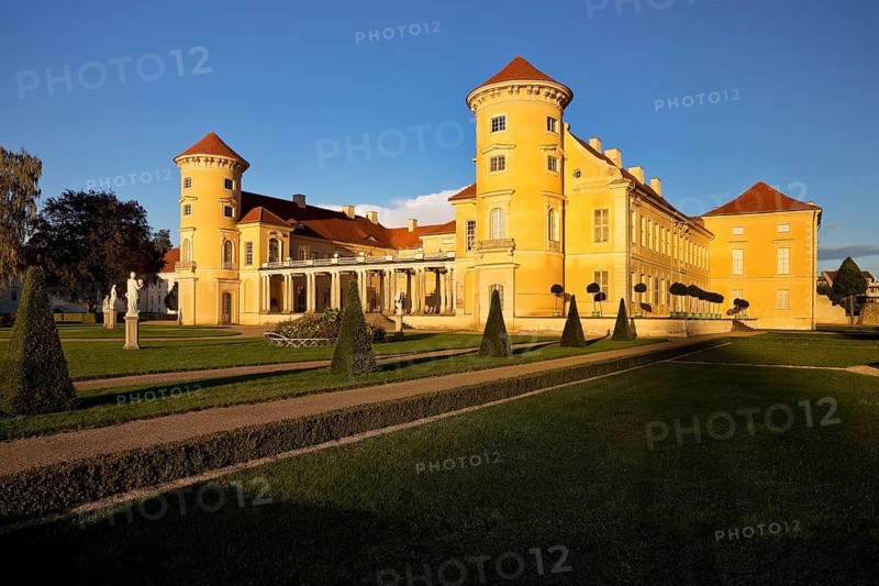Rheinsberg Castle, front in late evening light, prime example of Friederician Rococo, Ruppiner Land, Brandenburg, Germany